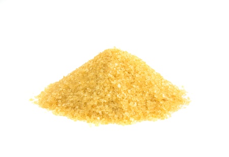 Granulated sugar against a white backgroundの写真素材