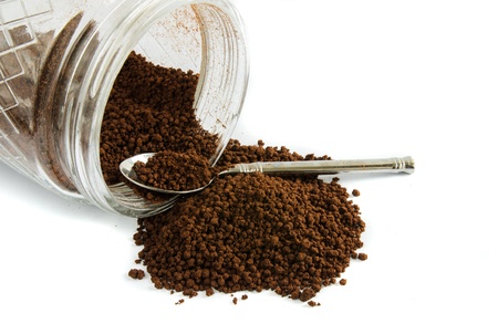 Instant coffee in a jar against a white backgroundの写真素材