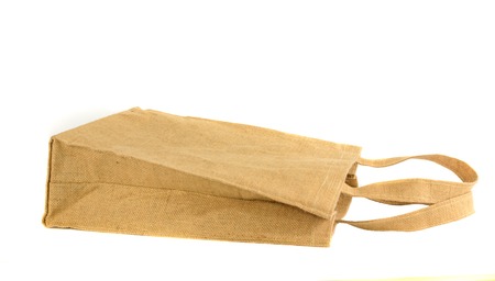Shopping bag made out of recycled  sack with isolated white の写真素材