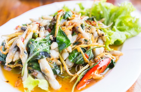 Fried Spicy Herbal Vegetables With Razor Clams,Thai Food Local in SamutSongKhram Province Thailandの写真素材