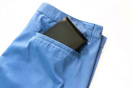 Trousers with black wallet on its pocket white backgroundの写真素材