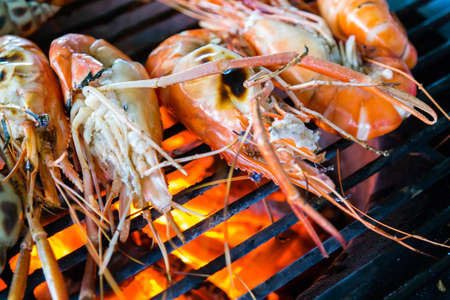 Delicious shrimp grill with charcoalの写真素材