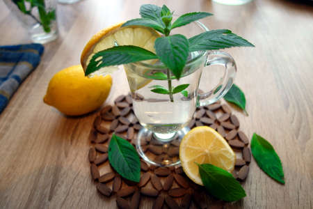 Healthy beverage with lemon and mintの写真素材