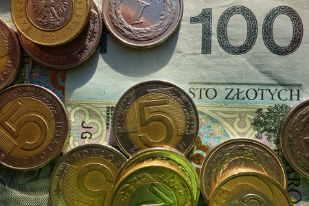 Polish money - PLN Hundred banknote and coinsの写真素材