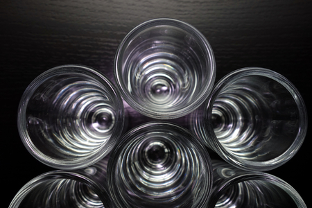 Empty transparent glasses for vodka, top viewの写真素材