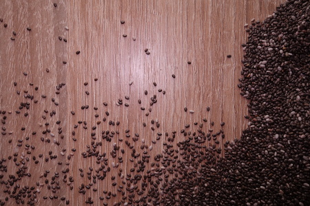 Healthy chia seeds on wooden table, top viewの写真素材