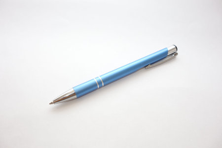 Blue pen isolated on white backgroundの写真素材
