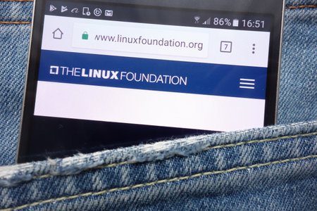 KONSKIE, POLAND - MAY 17, 2018: The Linux Foundation website displayed on smartphone hidden in jeans pocketのeditorial素材