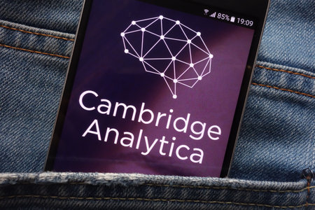 KONSKIE, POLAND - MAY 18, 2018: Cambridge Analytica website displayed on smartphone hidden in jeans pocketのeditorial素材