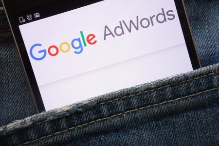 KONSKIE, POLAND - MAY 19, 2018: Google AdWords website displayed on smartphone hidden in jeans pocketのeditorial素材