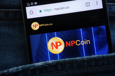 KONSKIE, POLAND - MAY 19, 2018: NPCoin website displayed on smartphone hidden in jeans pocketのeditorial素材