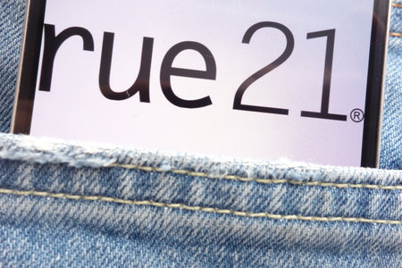 KONSKIE, POLAND - JUNE 02, 2018: rue 21 logo displayed on smartphone hidden in jeans pocketのeditorial素材