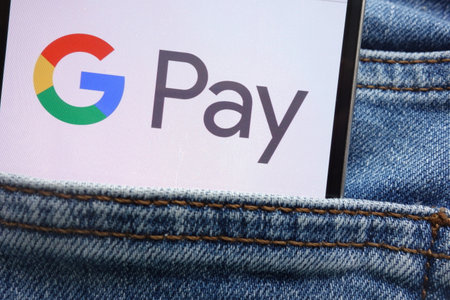 KONSKIE, POLAND - JUNE 09, 2018: Google Pay logo displayed on smartphone hidden in jeans pocketのeditorial素材