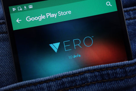 KONSKIE, POLAND - JUNE 11, 2018: Vero app on Google Play Store website displayed on smartphone hidden in jeans pocketのeditorial素材