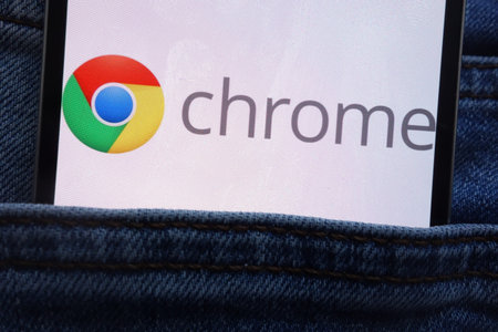 KONSKIE, POLAND - JUNE 11, 2018: Google Chrome logo displayed on smartphone hidden in jeans pocket