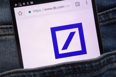 KONSKIE, POLAND - JUNE 12, 2018: Deutsche Bank website displayed on smartphone hidden in jeans pocketのeditorial素材