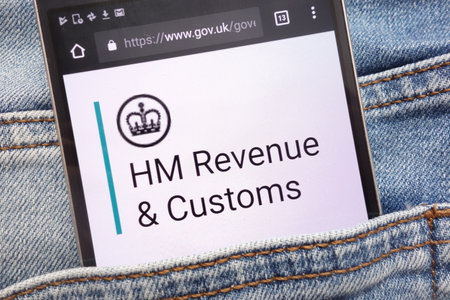 KONSKIE, POLAND - JUNE 12, 2018: Gov.uk website is displayed on smartphone hidden in jeans pocketのeditorial素材