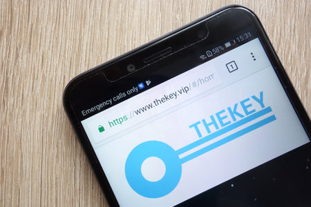 KONSKIE, POLAND - JULY 08, 2018: THEKEY (TKY) cryptocurrency website is displayed on Huawei Y6 2018 smartphoneのeditorial素材