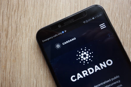 KONSKIE, POLAND - JULY 08, 2018: Cardano (ADA) cryptocurrency website is displayed on Huawei Y6 2018 smartphoneのeditorial素材