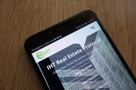 KONSKIE, POLAND - JULY 17, 2018: IHT Real Estate Protocol cryptocurrency website displayed on a...