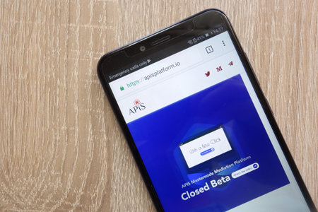 KONSKIE, POLAND - JULY 14, 2018: APIS cryptocurrency website is displayed on a modern smartphoneのeditorial素材