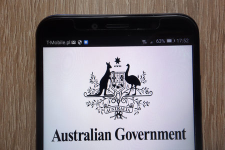 KONSKIE, POLAND - SEPTEMBER 06, 2018: Australian government logo displayed on a modern smartphoneのeditorial素材