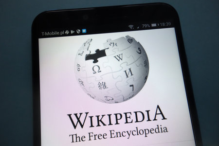 KONSKIE, POLAND - SEPTEMBER 15, 2018: Wikipedia logo he smartphone