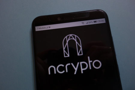 KONSKIE, POLAND - November 10, 2018: NCrypto (NCR) cryptocurrency logo on smartphoneのeditorial素材