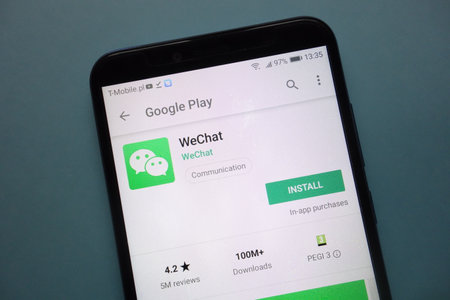 KONSKIE, POLAND - November 25, 2018: WeChat app on Google Play website displayed on smartphoneのeditorial素材