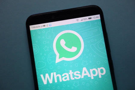 KONSKIE, POLAND - November 25, 2018: WhatsApp Messenger logo displayed on smartphoneのeditorial素材