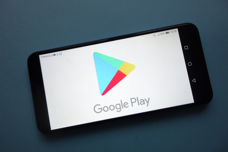 KONSKIE, POLAND - November 25, 2018: Google Play logo displayed on smartphoneのeditorial素材