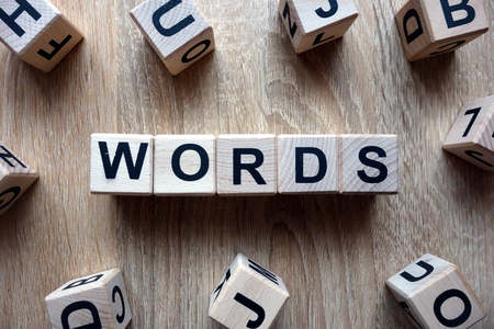 Words text from wooden blocks on deskの写真素材
