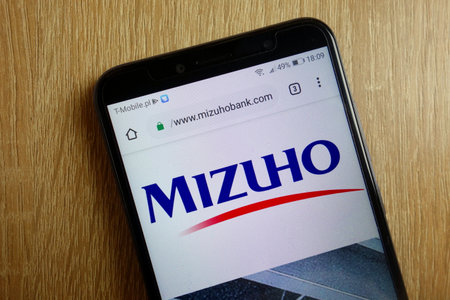 KONSKIE, POLAND - January 25, 2019: Mizuho Financial Group website (www.mizuhobank.com) displayed on smartphoneのeditorial素材