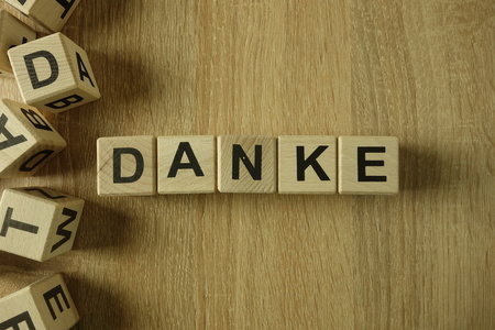 Danke word from wooden blocks on deskの写真素材