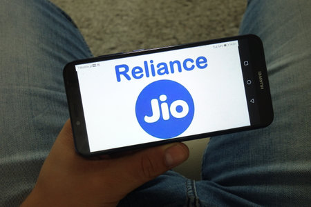 KONSKIE, POLAND - June 29, 2019: Reliance Jio Infocomm Limited Indian mobile network operator logo displayed on mobile phoneのeditorial素材
