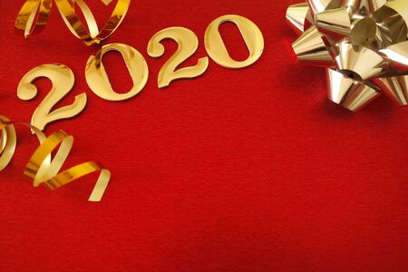 Happy New Year 2020. Symbol from number 2020 on red background with copy space for your designの写真素材