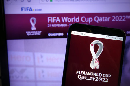 KONSKIE, POLAND - December 07, 2019: Fifa World Cup Qatar 2022 logo displayed on mobile phoneのeditorial素材