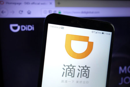 KONSKIE, POLAND - December 07, 2019: Didi Chuxing Technology Co logo displayed on mobile phoneのeditorial素材