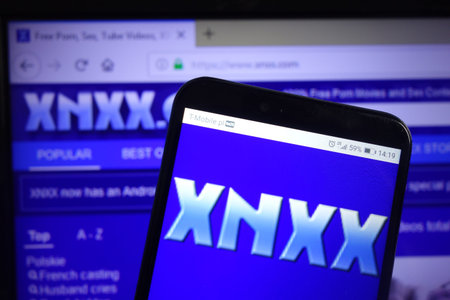 KONSKIE, POLAND - December 07, 2019: Xnxx service logo displayed on mobile phoneのeditorial素材