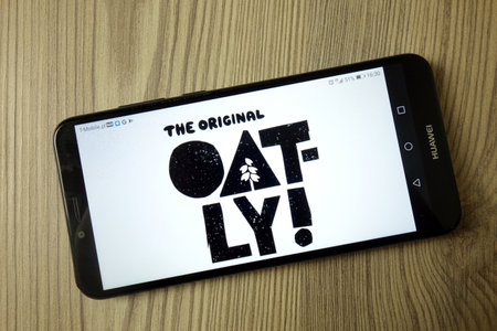 KONSKIE, POLAND - December 21, 2019: Oatly company logo displayed on mobile phoneのeditorial素材