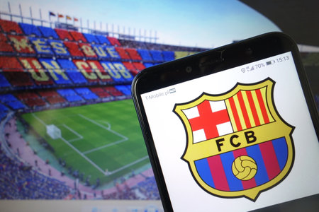 KONSKIE, POLAND - January 11, 2020: Futbol Club Barcelona logo displayed on mobile phoneのeditorial素材