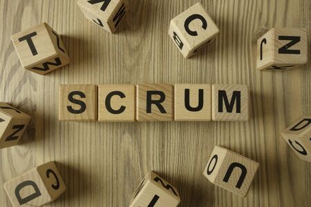 Word scrum from wooden blocks on deskの写真素材
