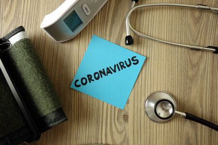 Word coronavirus with medical accessories, healthcare conceptの写真素材