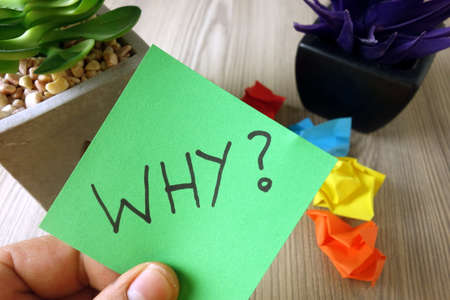Word why handwritten on sticky note, mystery conceptの写真素材