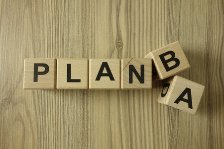 Text plan A or B from wooden blocks, business strategy concept