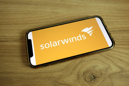 KONSKIE, POLAND - June 9, 2021: Solarwinds company logo displayed on mobile phoneのeditorial素材
