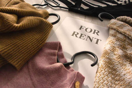 Women's clothes for rent. Used clothing rental and eco-friendly trend conceptの写真素材