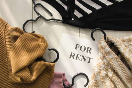 Women's clothes for rent. Used clothing rental and eco-friendly trend conceptの写真素材