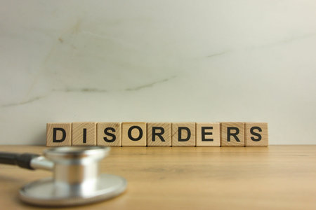 Word disorders from wooden blocks with stethoscope. Mental health concept