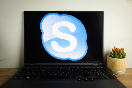 KONSKIE, POLAND - July 06, 2022: Skype videoconferencing app logo displayed on laptop computer screenのeditorial素材